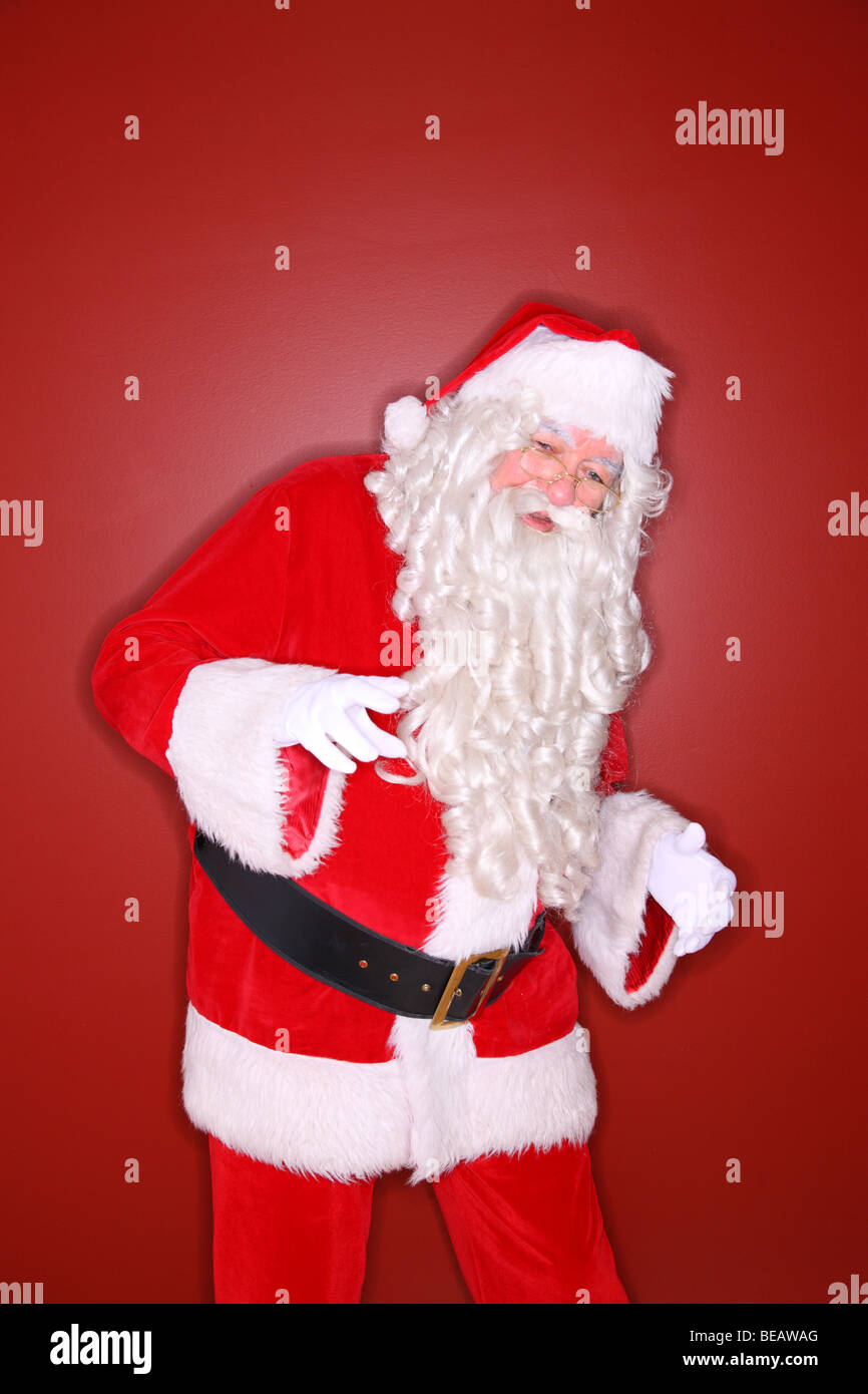 Ring flash shot of santa claus dancing Stock Photo