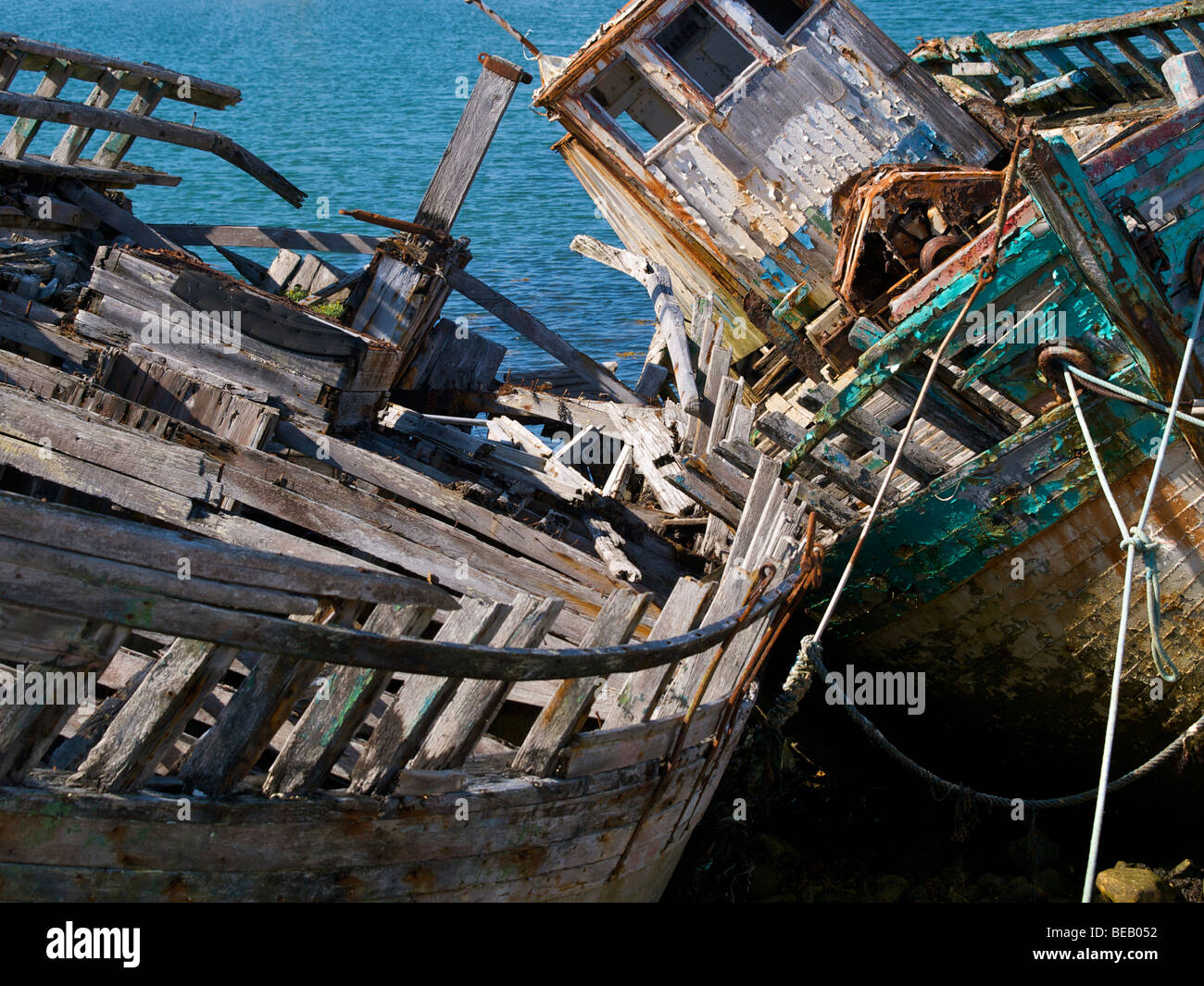 Colourful wrecks of fishingboats on the shore at Camaret sur mer, Brittany, France Stock Photo