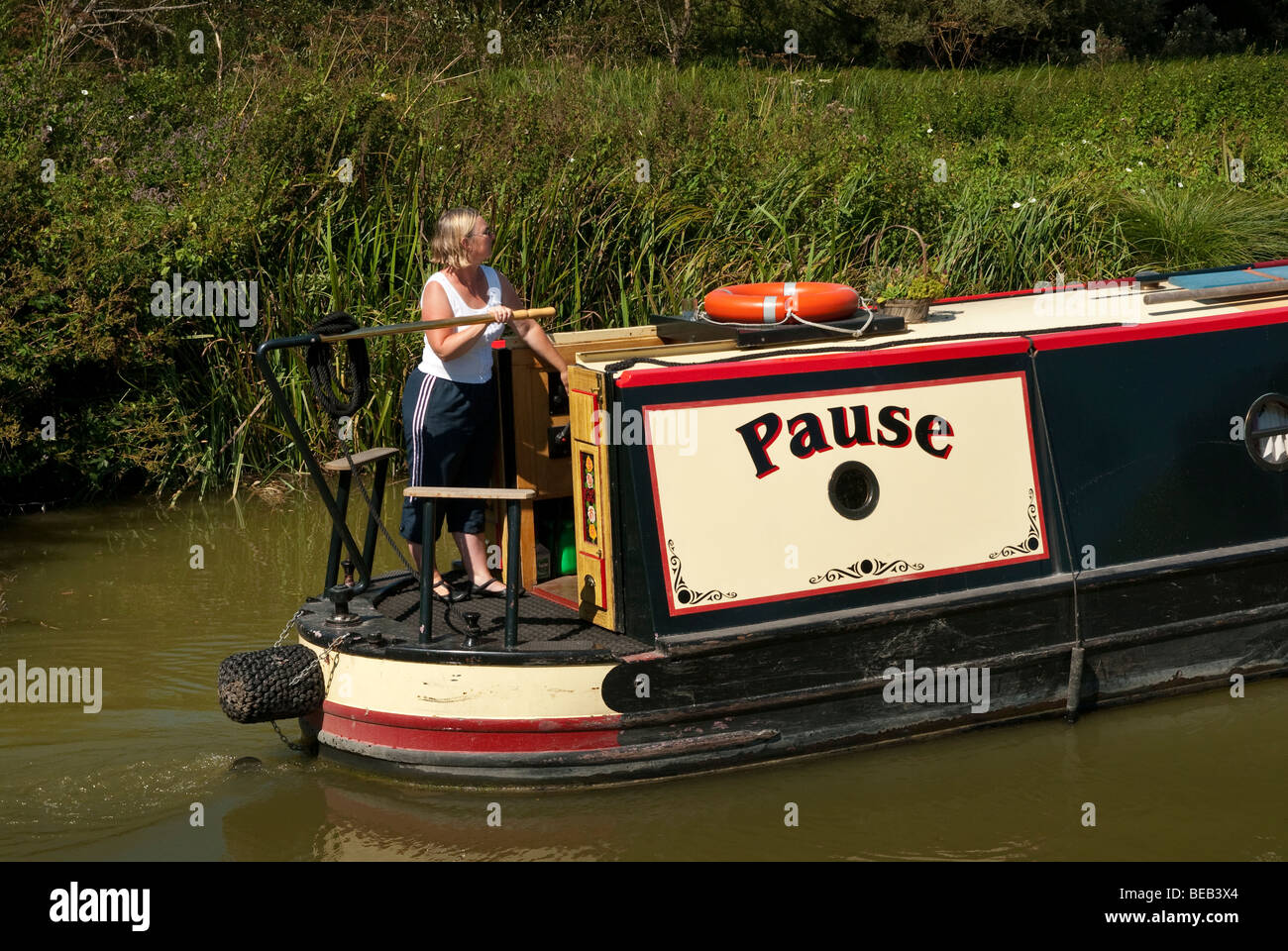 Female steering barge hi-res stock photography and images - Alamy