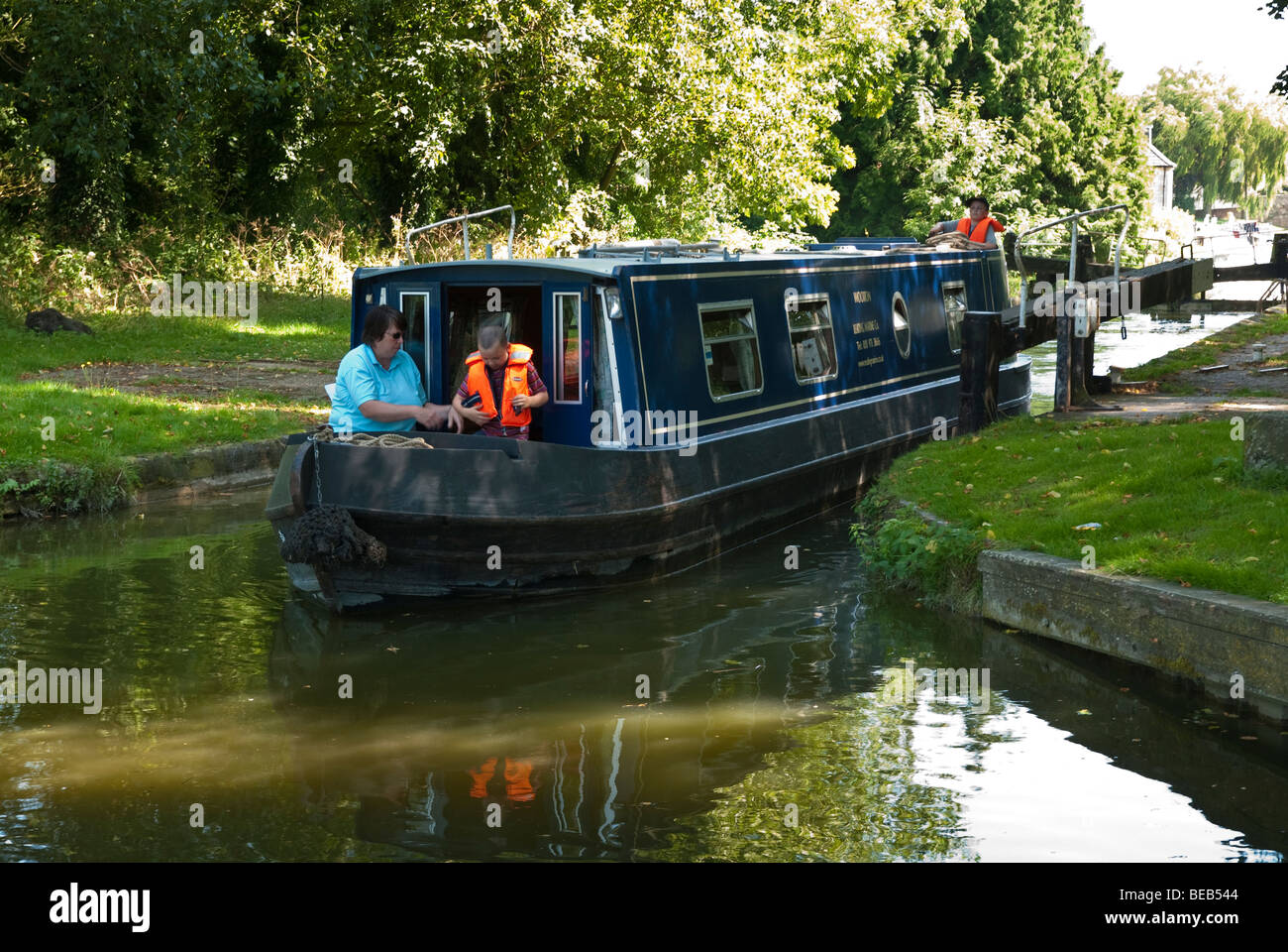Female steering barge hi-res stock photography and images - Alamy