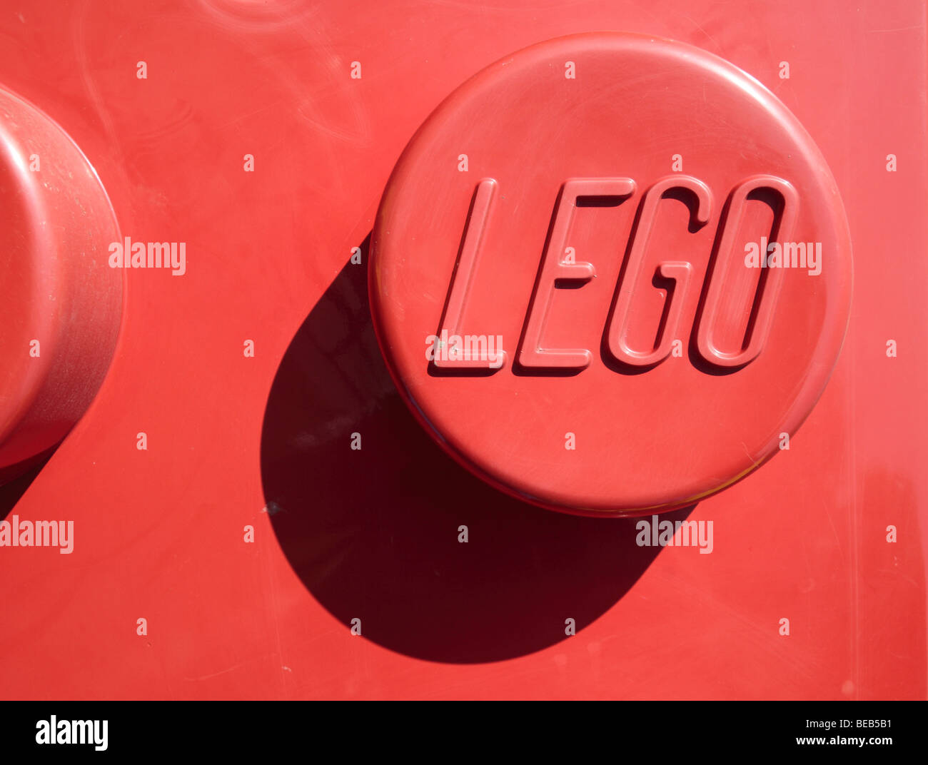 Close up of the Lego branding on a giant red Lego block outside Legoland, Windsor, UK. Stock Photo