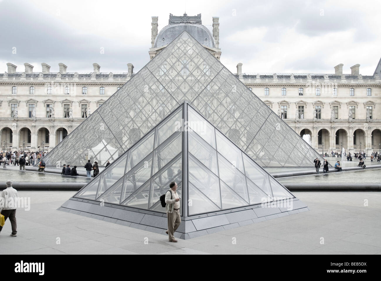 The Louvre Pyramid, part of the Lourve Museum in Paris Stock Photo