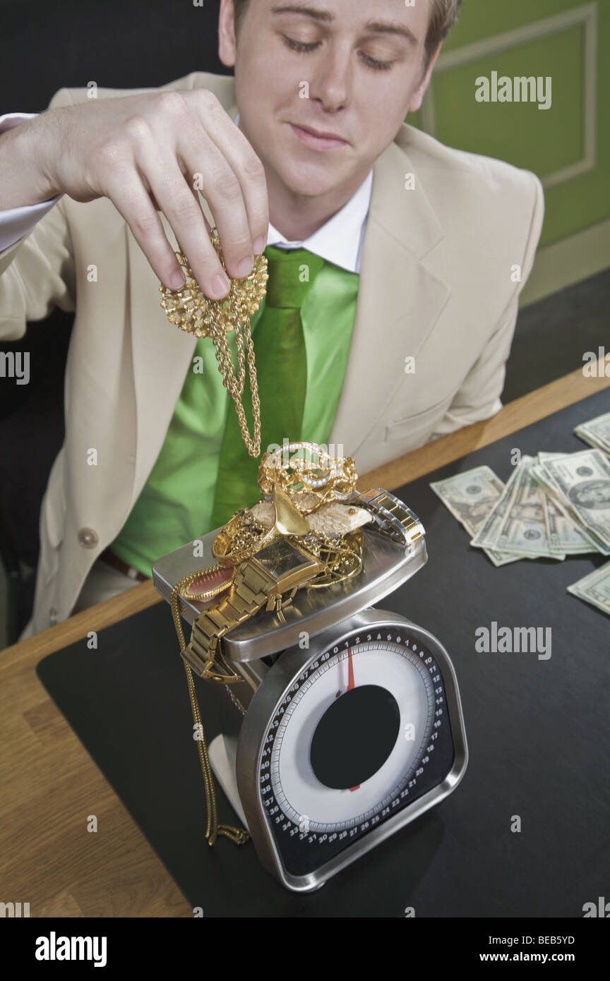 Gold color scale down hi-res stock photography and images - Alamy