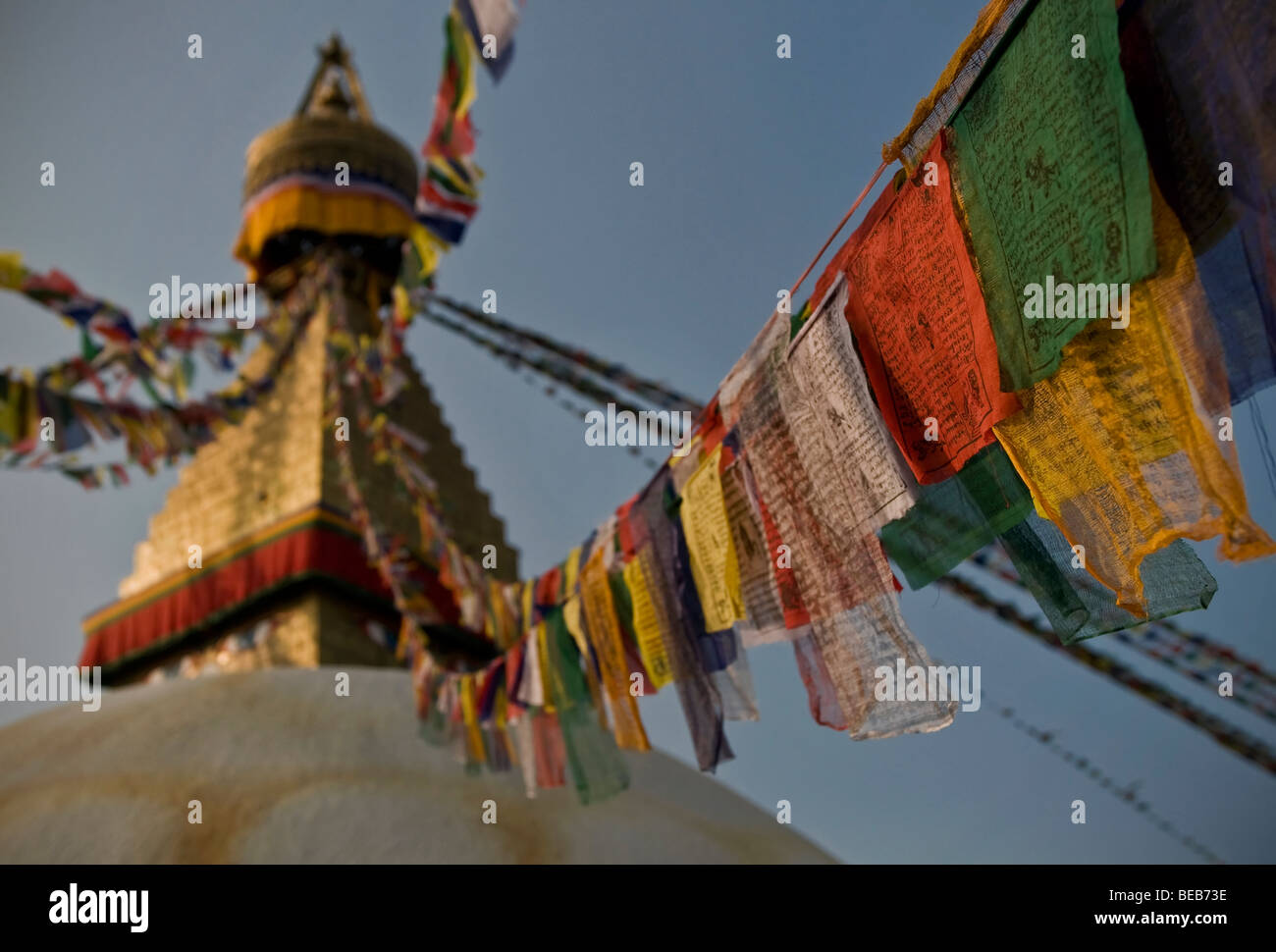 Prayer Flags at dusk, Bodnath, Kathmandu, Nepal Stock Photo