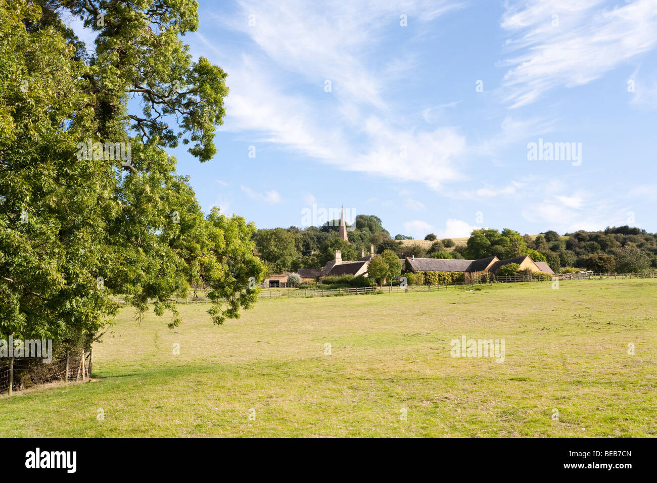 Summer skies over the Cotswold village of Saintbury, Gloucestershire Stock Photo