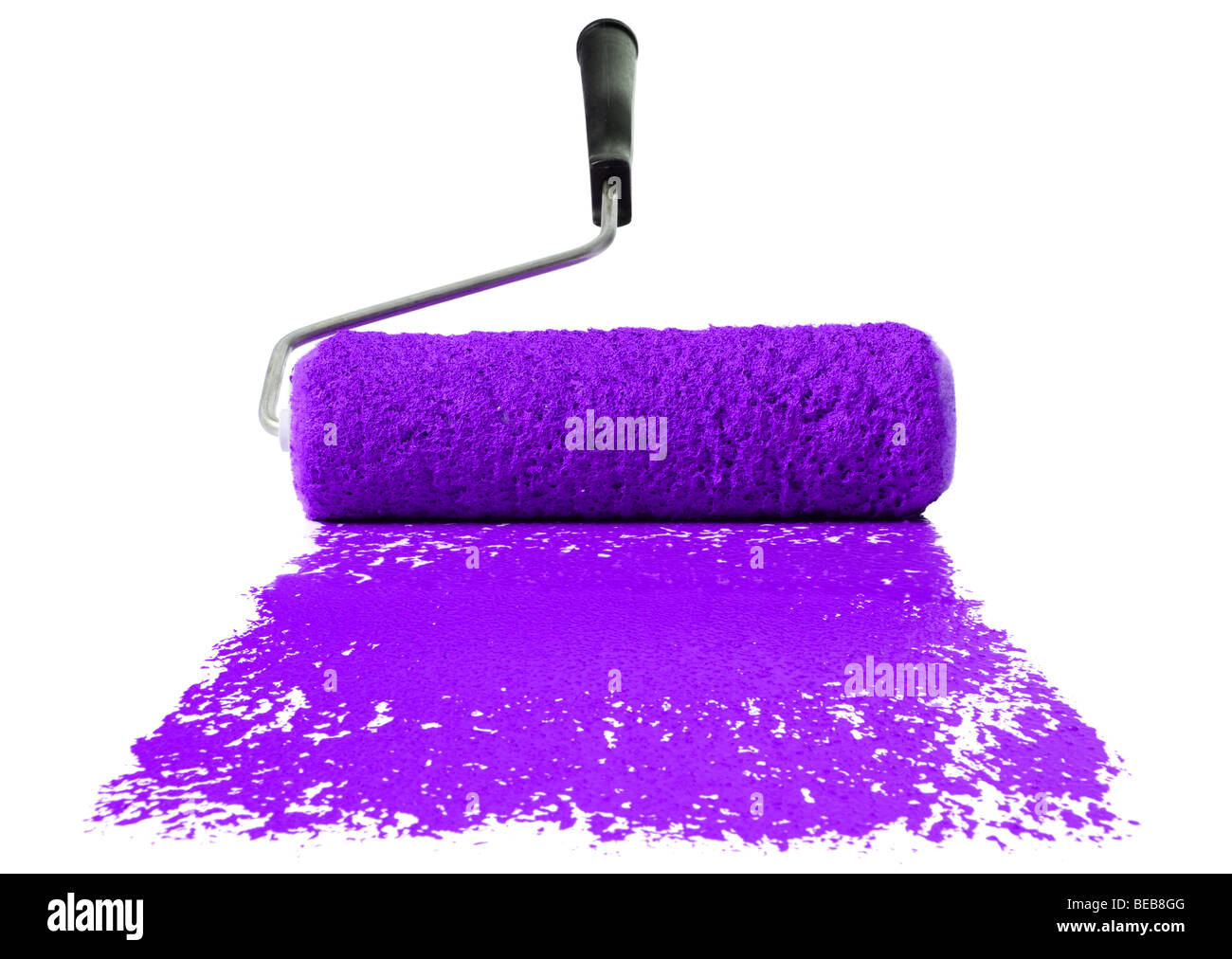 Paint roller With purple paint isolated over white background Stock Photo