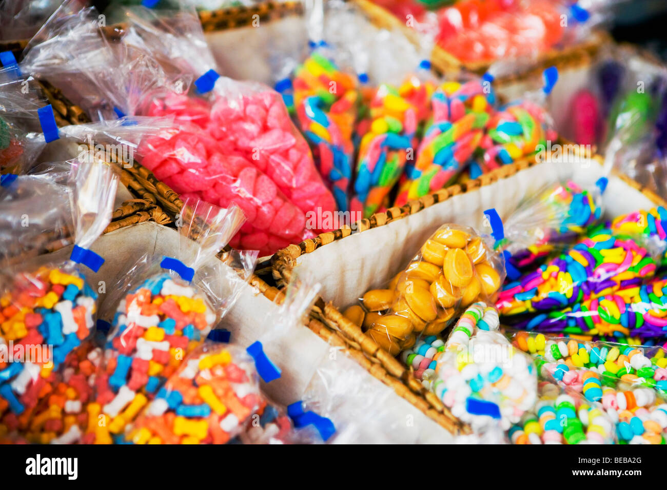Close-up of assorted candy in plastic bags Stock Photo