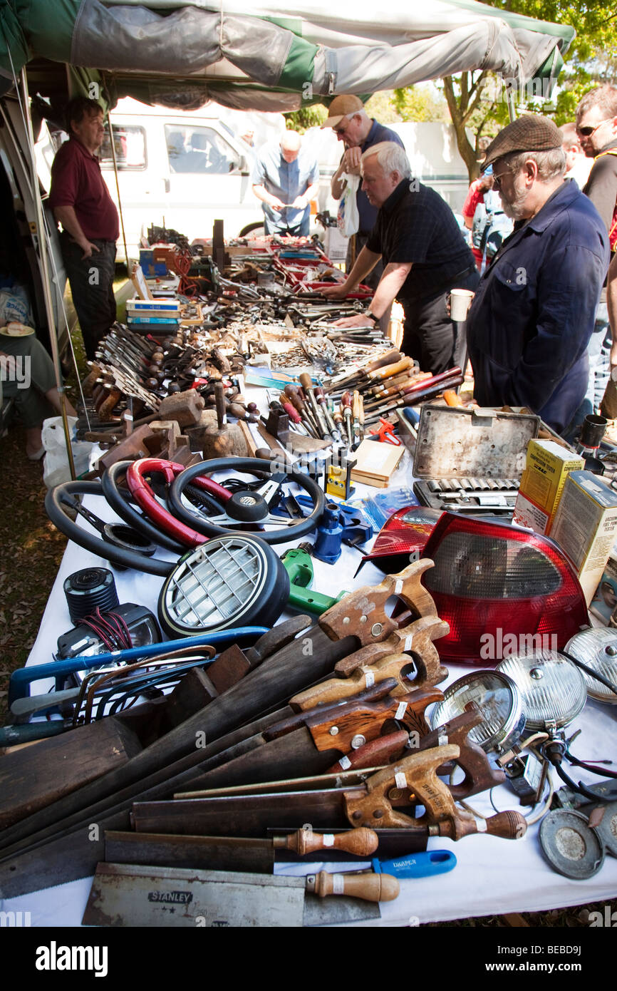 Market stall selling tools and used car parts Abergavenny Wales UK Stock Photo