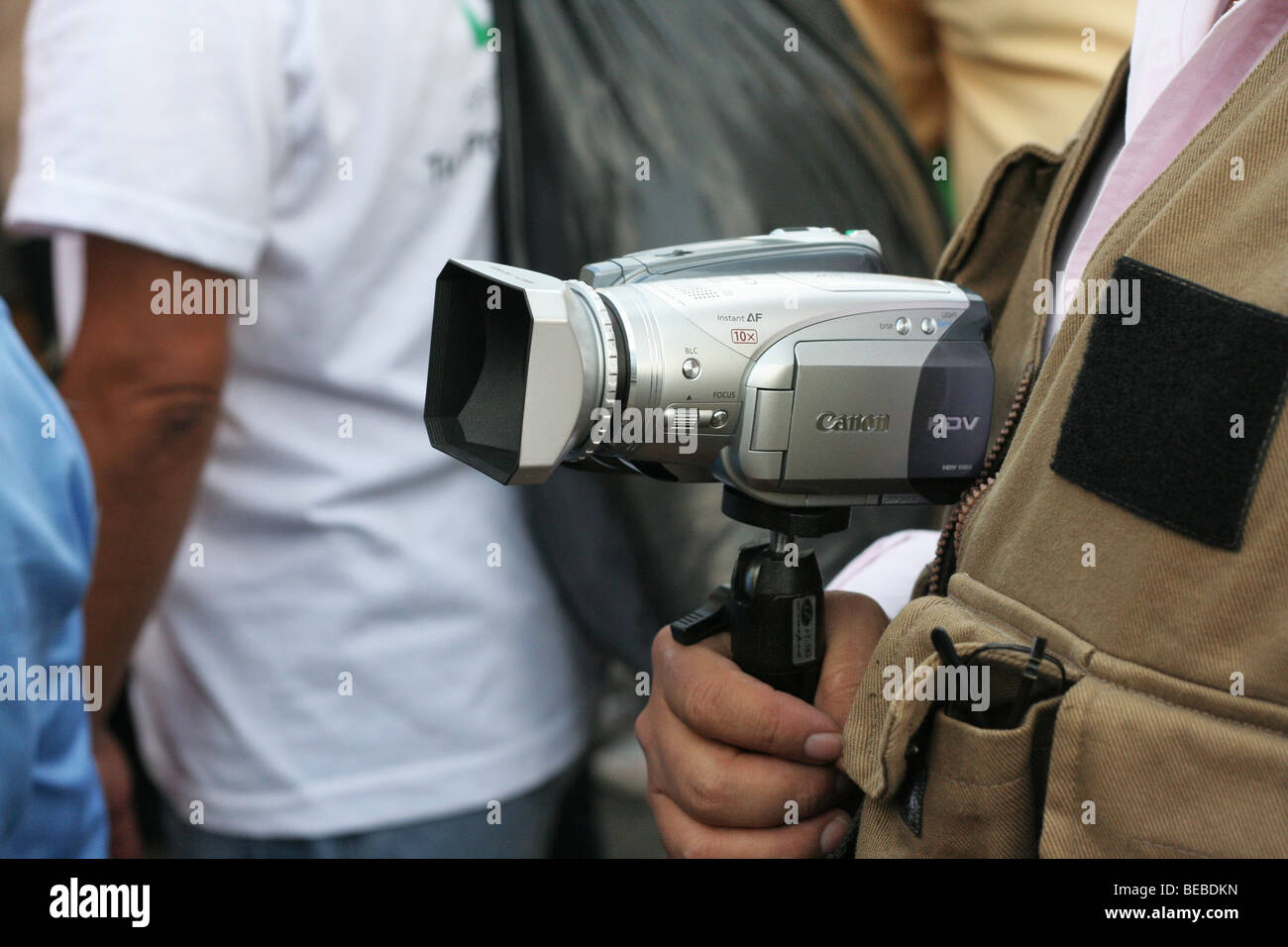 Canon hv 20 video camera used by a news reporter. Stock Photo