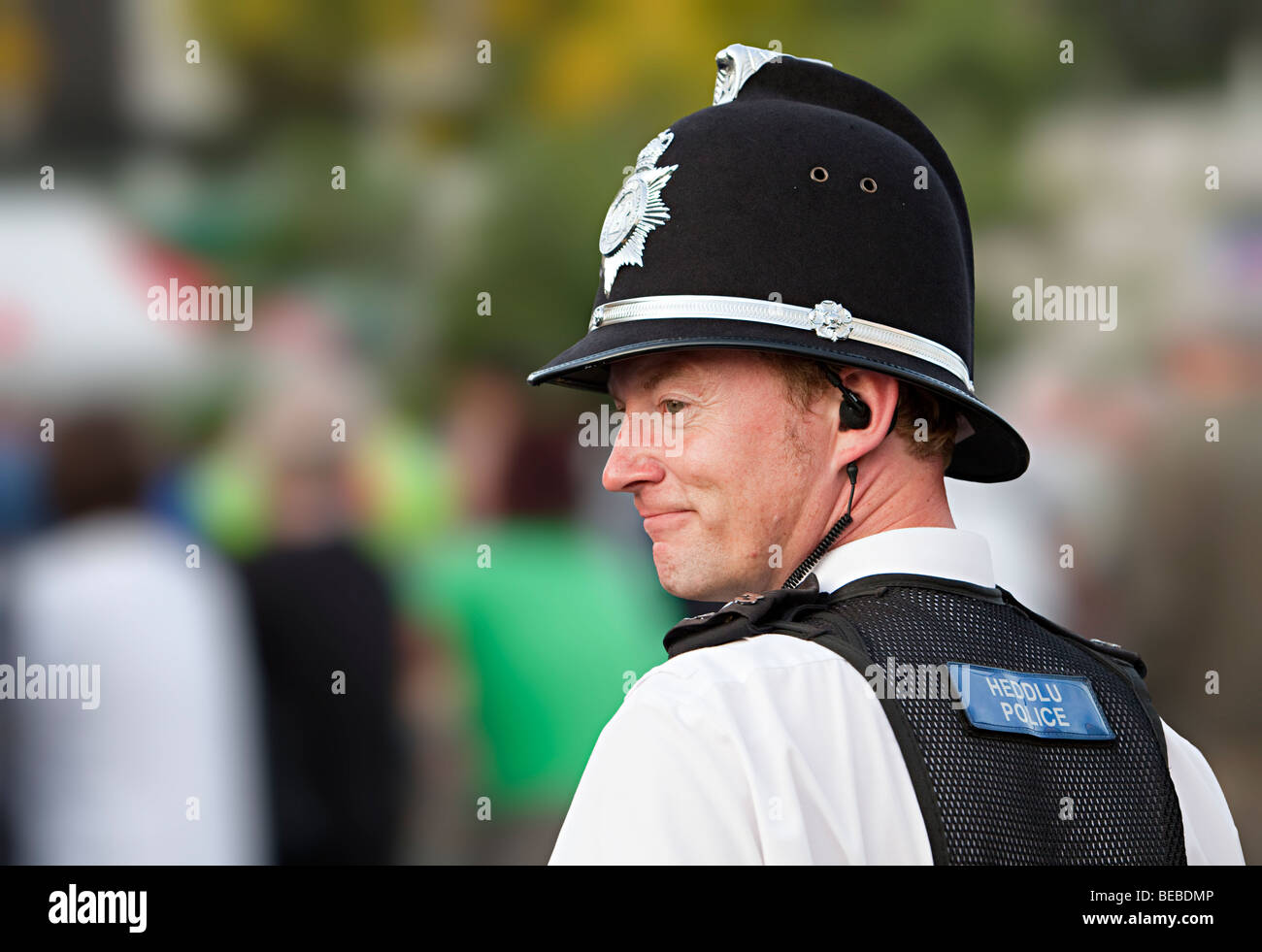Smiling policeman Wales UK Stock Photo