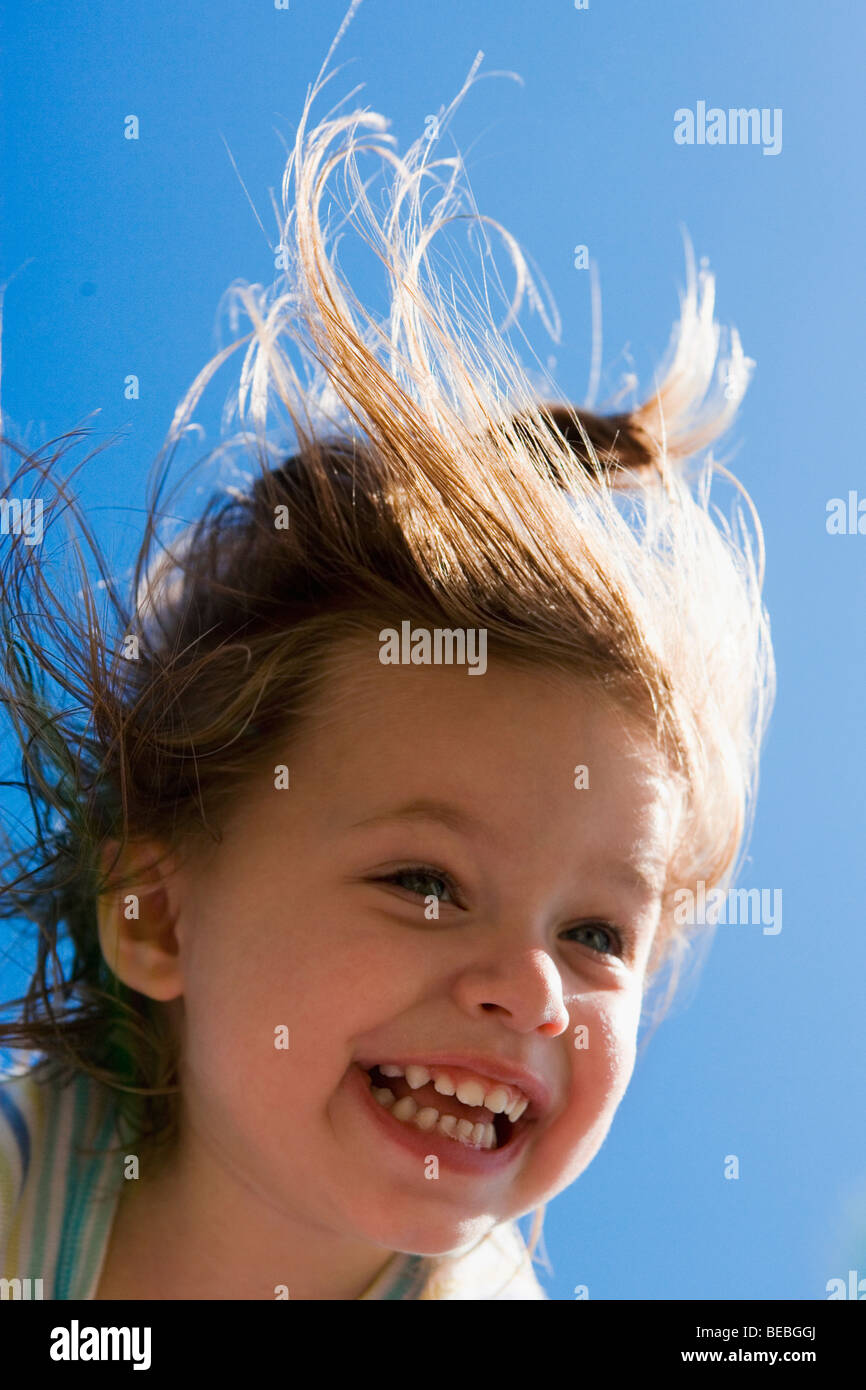 Close-up of a woman holding shopping bags Stock Photo