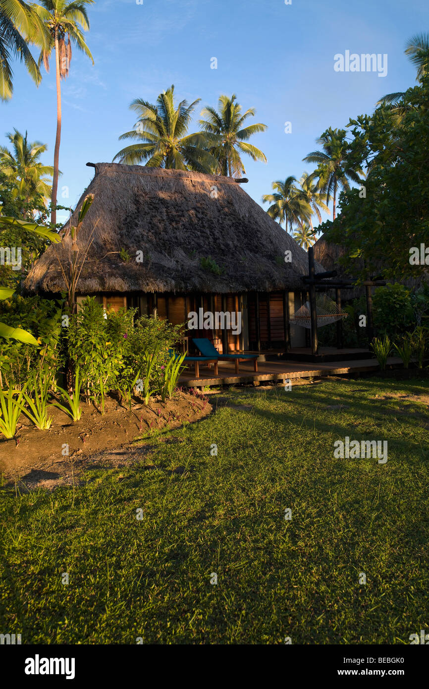 Tourist resort surrounded by palm trees Stock Photo - Alamy