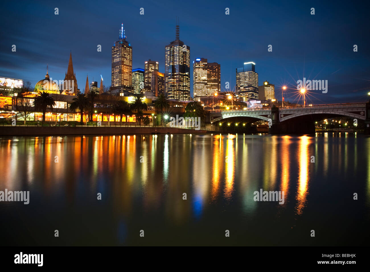 Melbourne's skyline at dusk reflected in the Yarra River Stock Photo ...