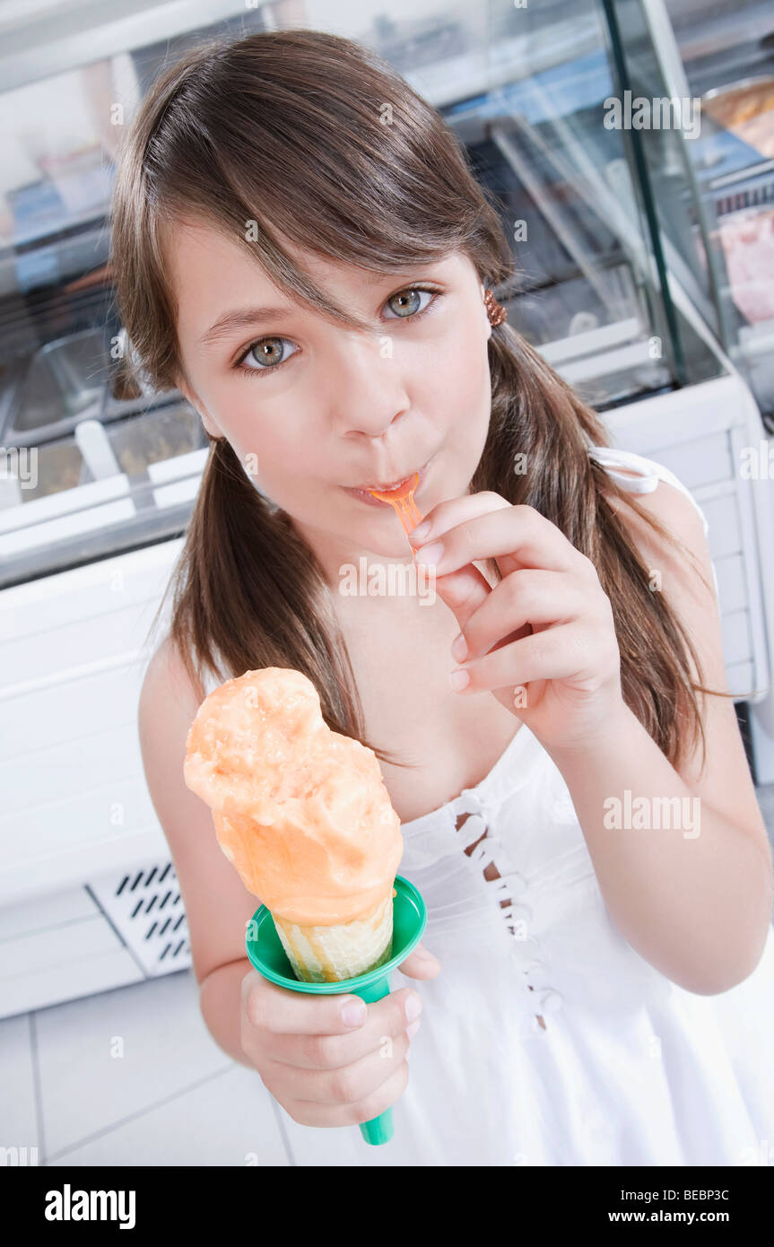Girl eating an ice cream Stock Photo Alamy
