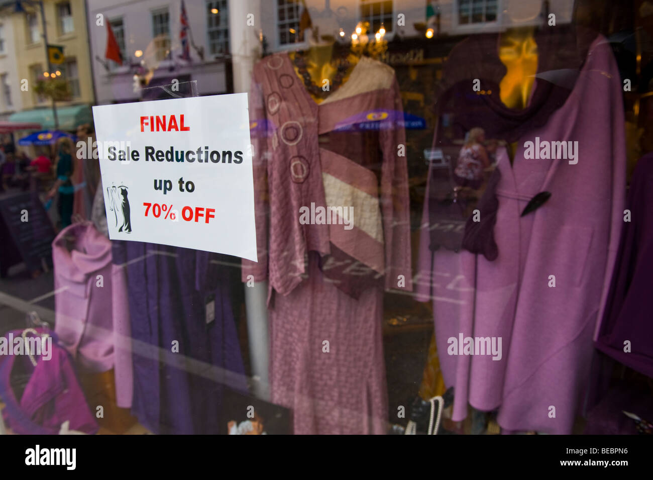 Final Sale Reductions Up To 70 Off Sign In Window Of Ladies Clothes Shop In Uk Stock Photo Alamy