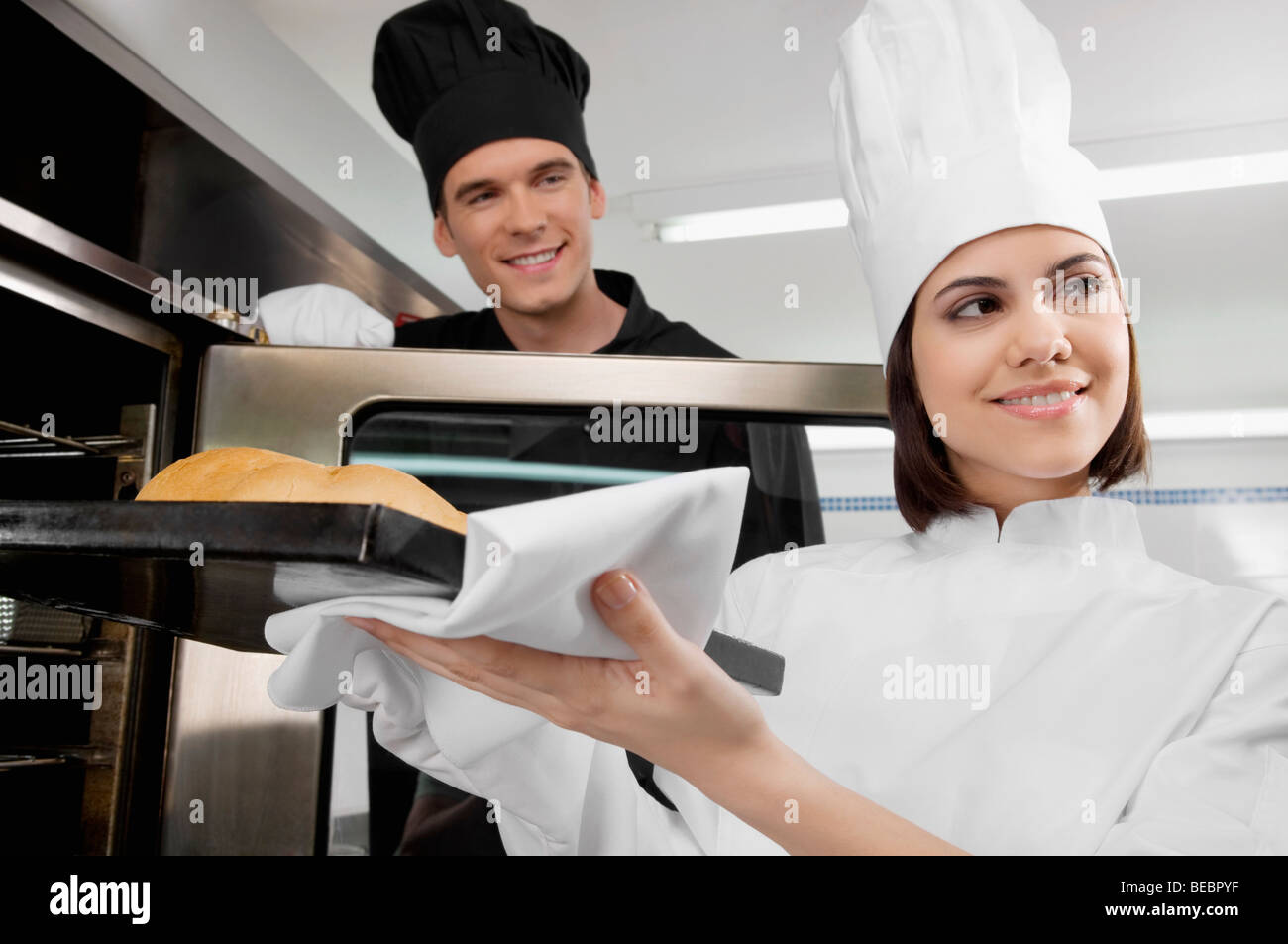 Chefs Preparing Food In The Kitchen Stock Photo - Alamy