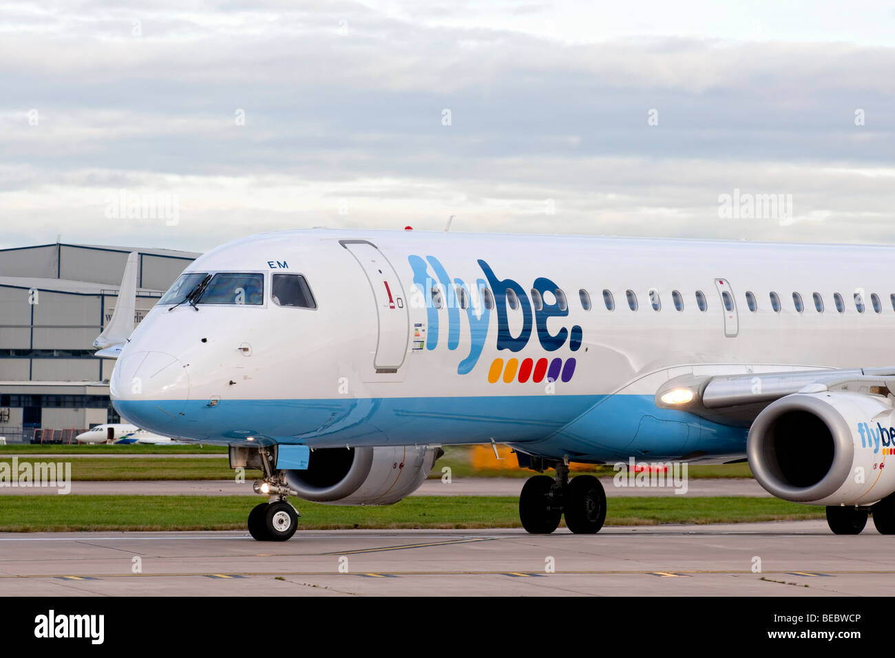 FlyBE aircraft taxiing for take off from Manchester Airport (Ringway Airport) in Manchester, England Stock Photo