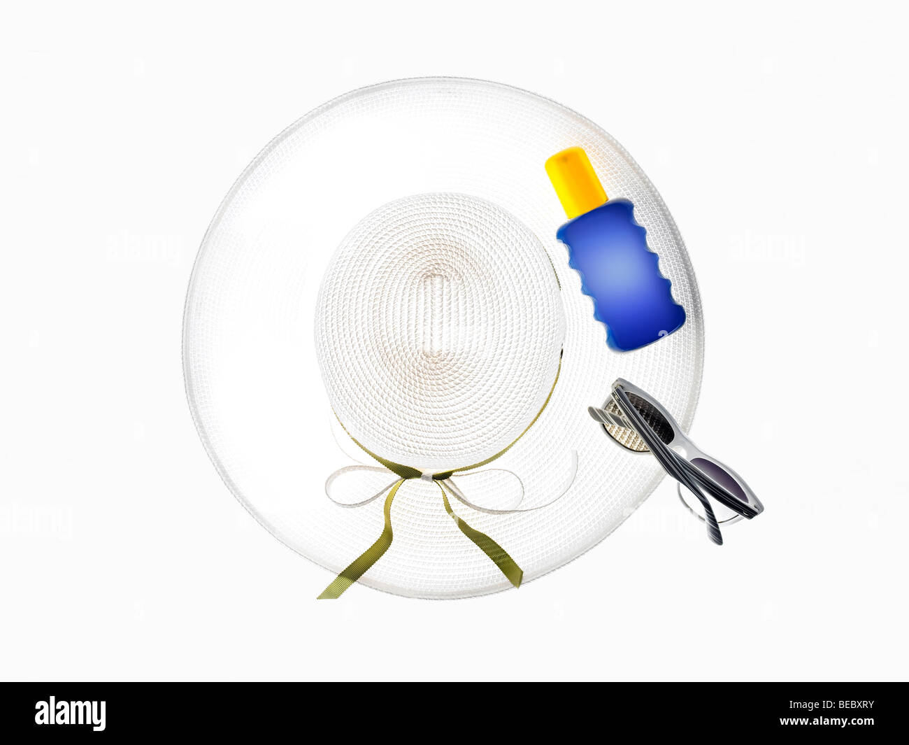 Hat, sunglasses and sunscreen. Stock Photo