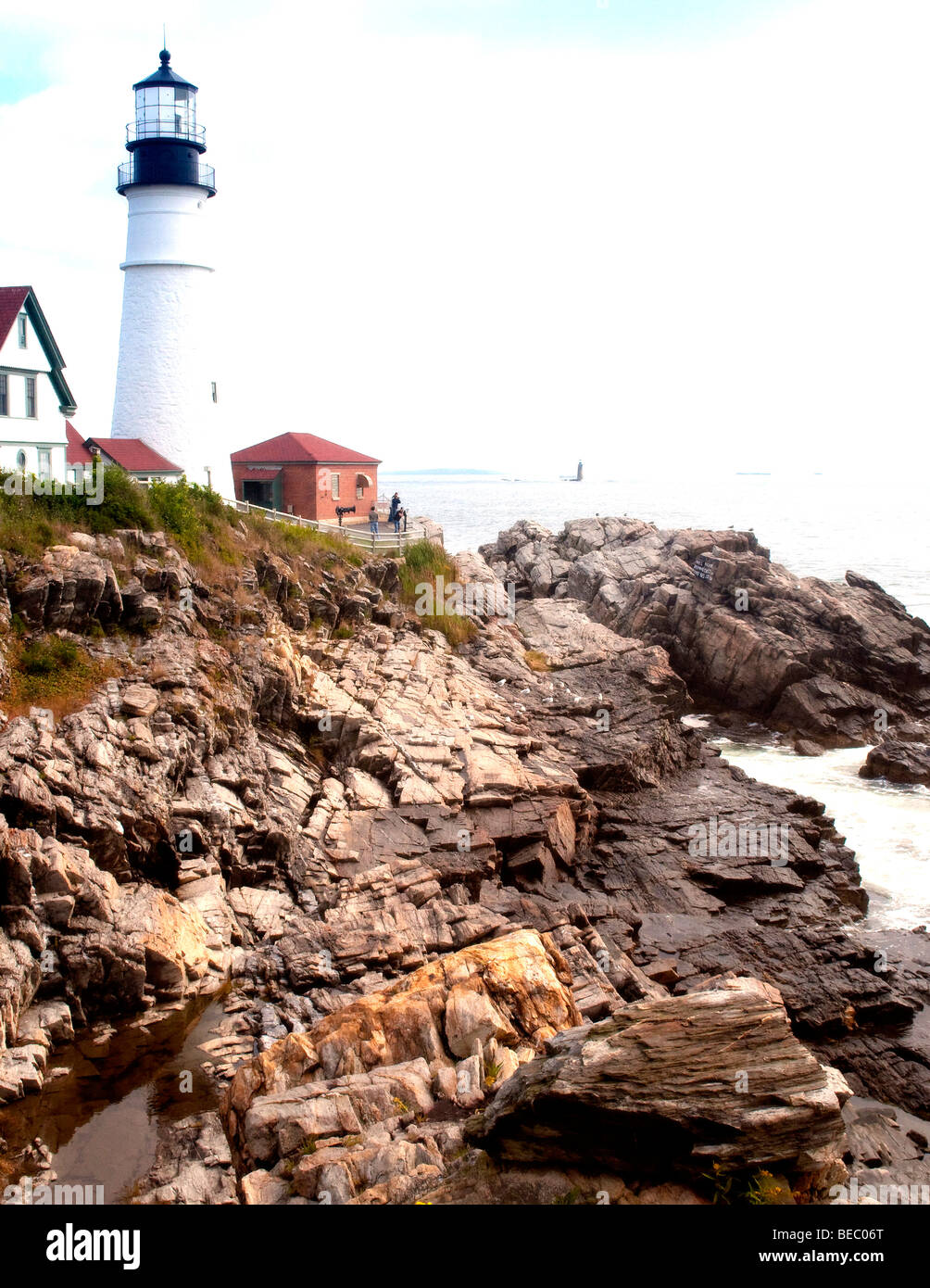 Famous Portland Head Light tosers over Maine's rocky coast Stock Photo