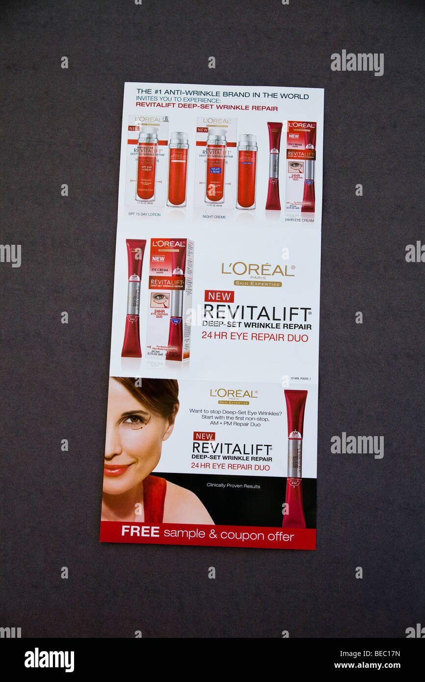 Free sample of Loreal skincare product sent out with Sunday newspaper. © Myrleen Pearson Stock Photo