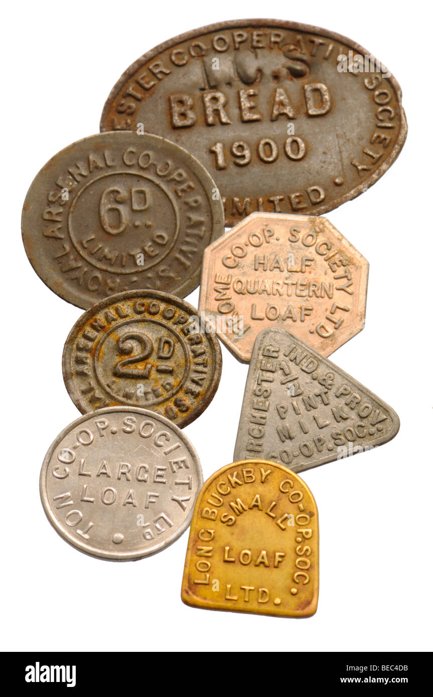 Co-op (Cooperative Society) tokens for bread and milk Stock Photo