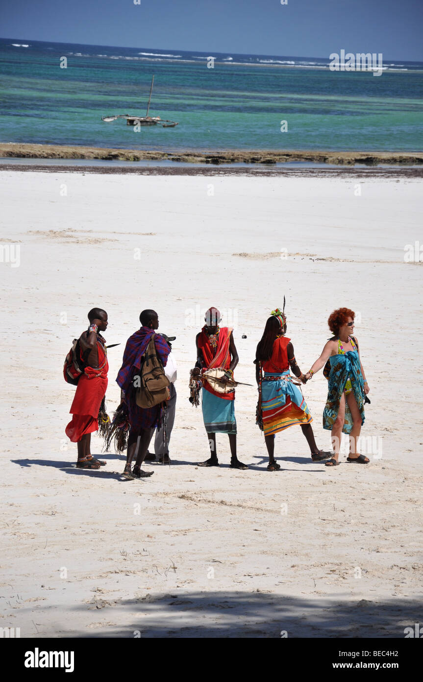 Masai tribe men on Diani Beach Kenya Africa Stock Photo