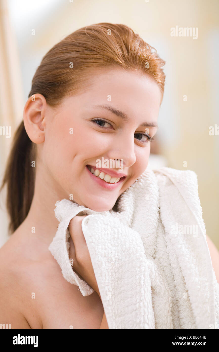Young woman beauty portrait with towel Stock Photo - Alamy