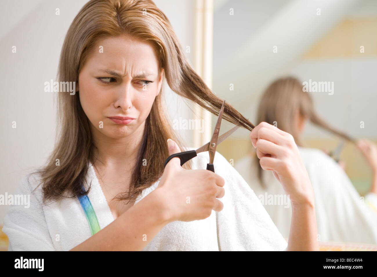 Young Woman Cutting Hair Stock Photo Alamy Young Woman Cutting Hair Stock Photo Alamy