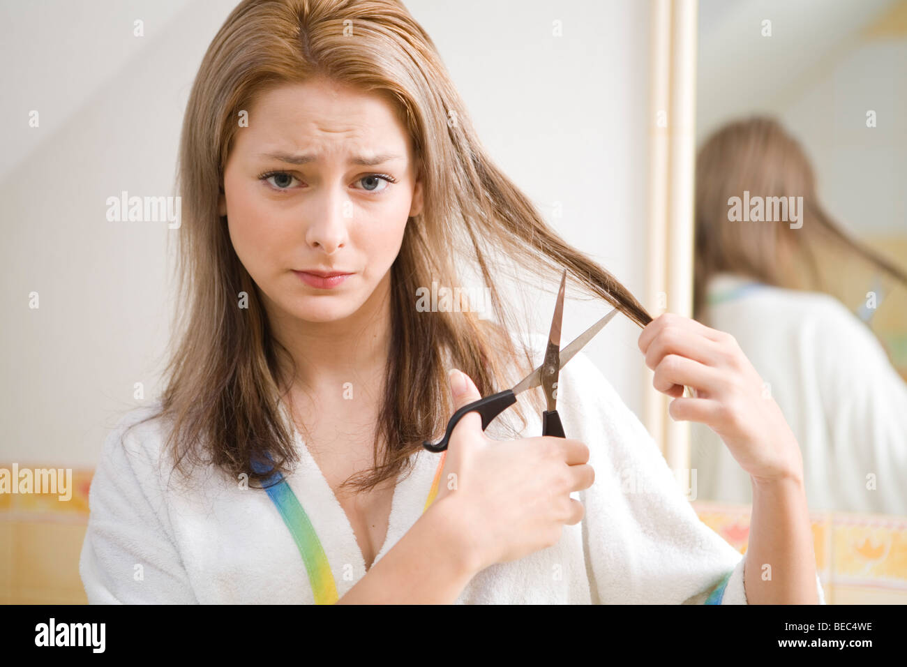 Young Woman Cutting Hair Stock Photo Alamy Young Woman Cutting Hair Stock Photo Alamy