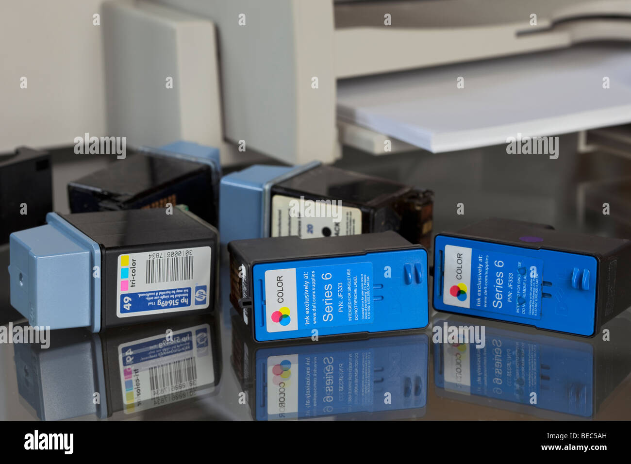 Empty printer cartridges with printer in the background Stock Photo Alamy