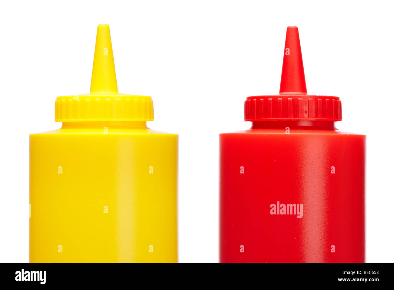 Ketchup and mustard bottles isolated on a white background Stock Photo