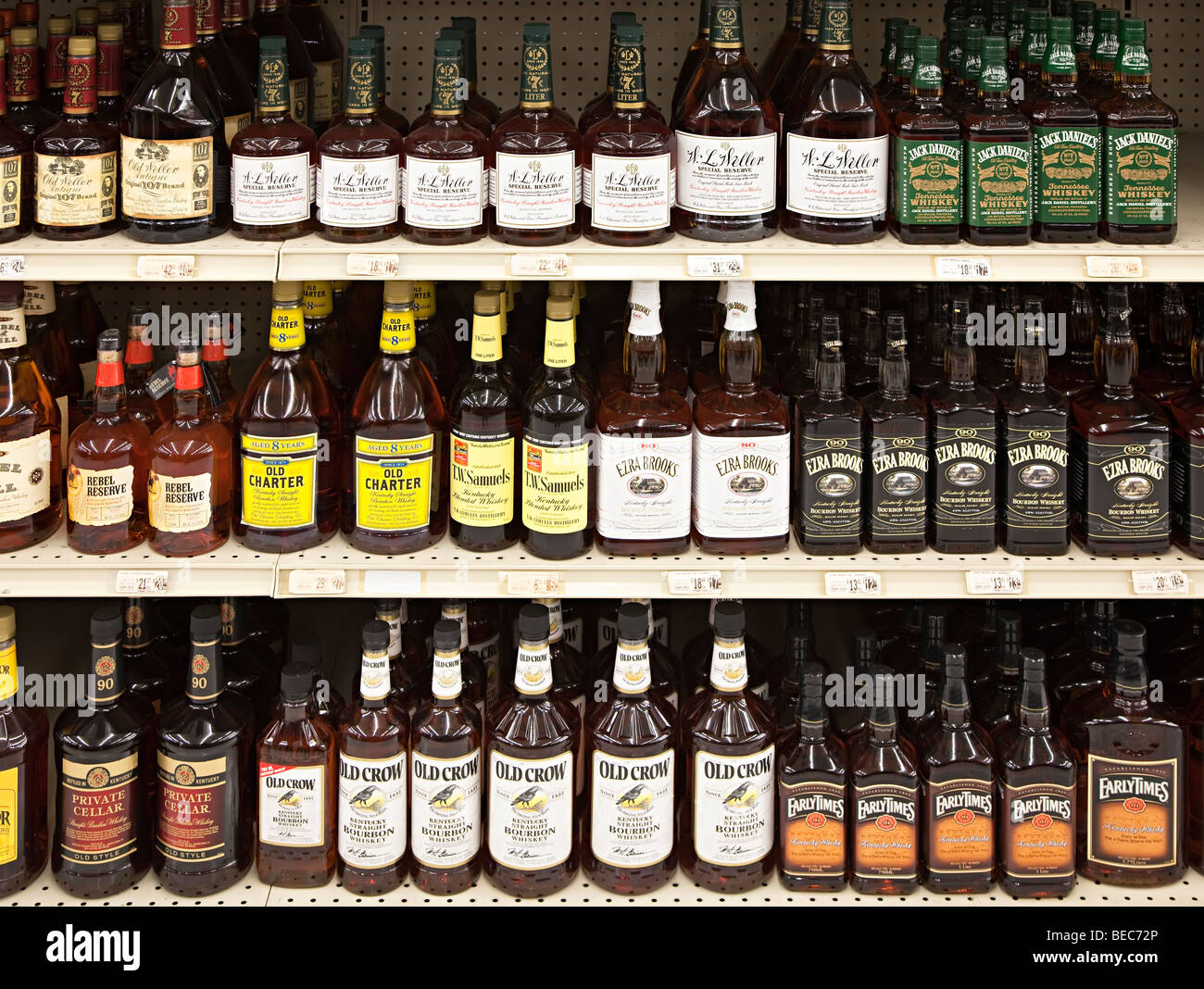 Selection of bourbon whiskey on shelf of liquor store Houston Texas USA Stock Photo