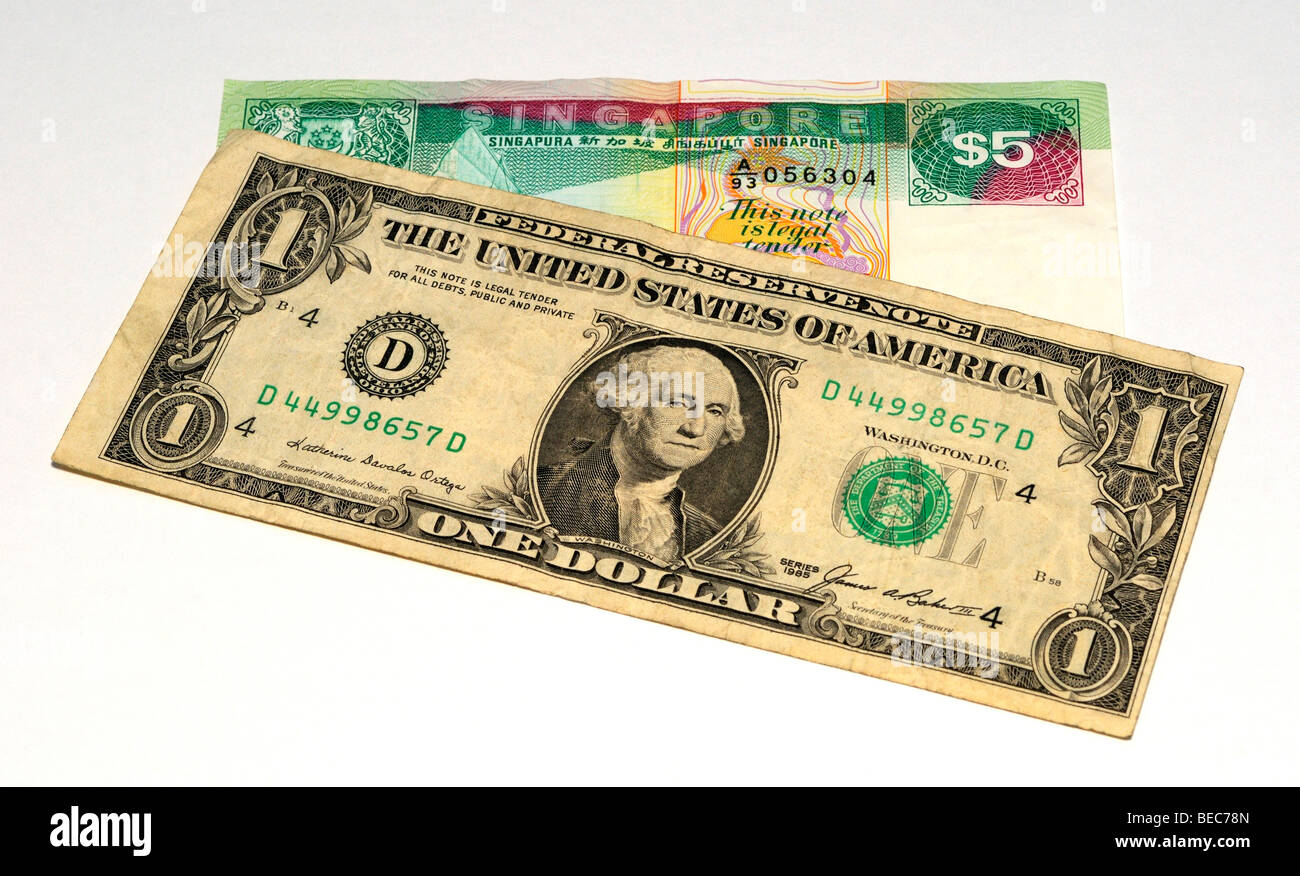 USA Dollar and Singapore Dollar Bank Notes. Stock Photo
