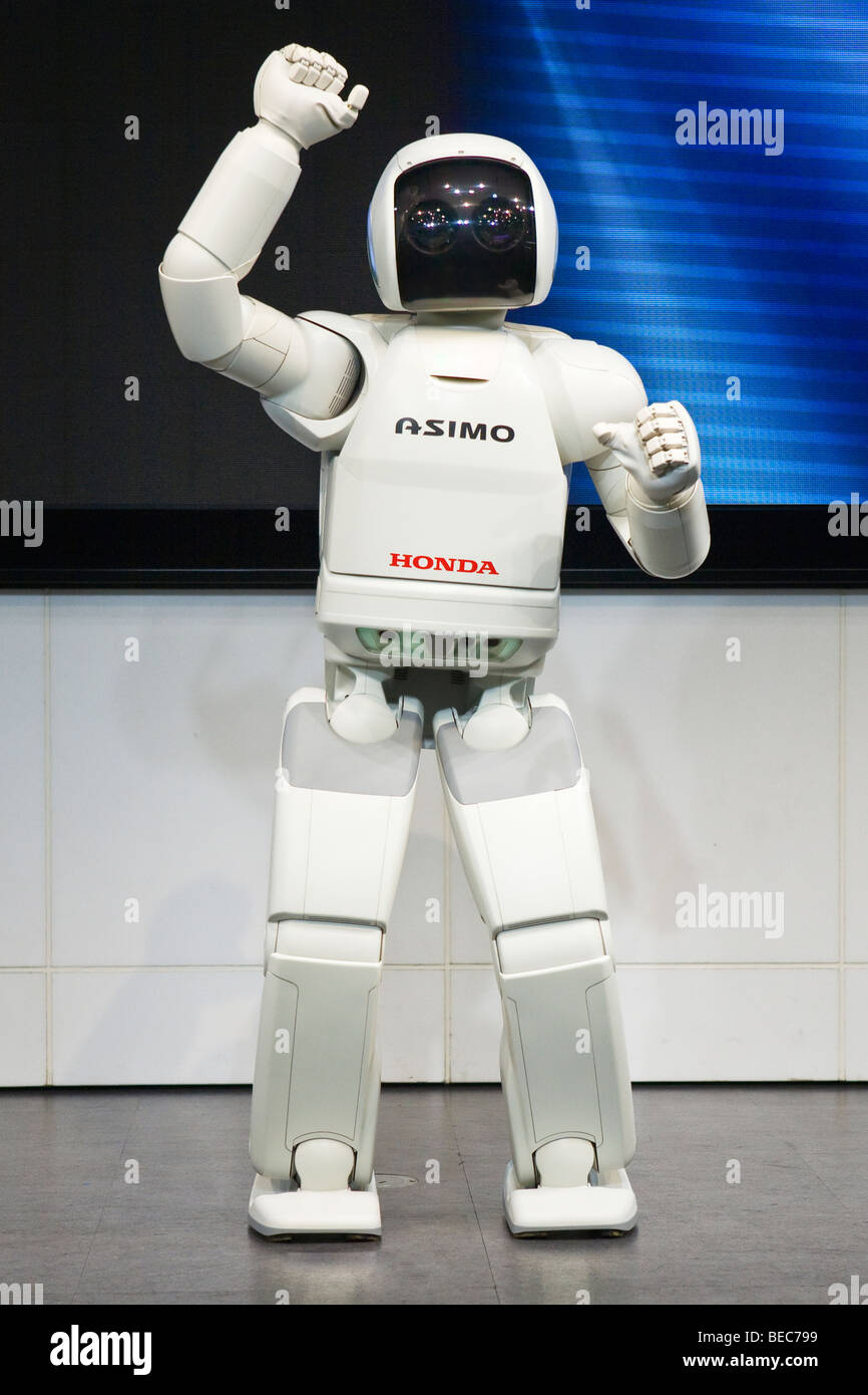 Asimo a humanoid robot created by Honda giving a performance on stage at  the company headquarters in Tokyo Stock Photo - Alamy