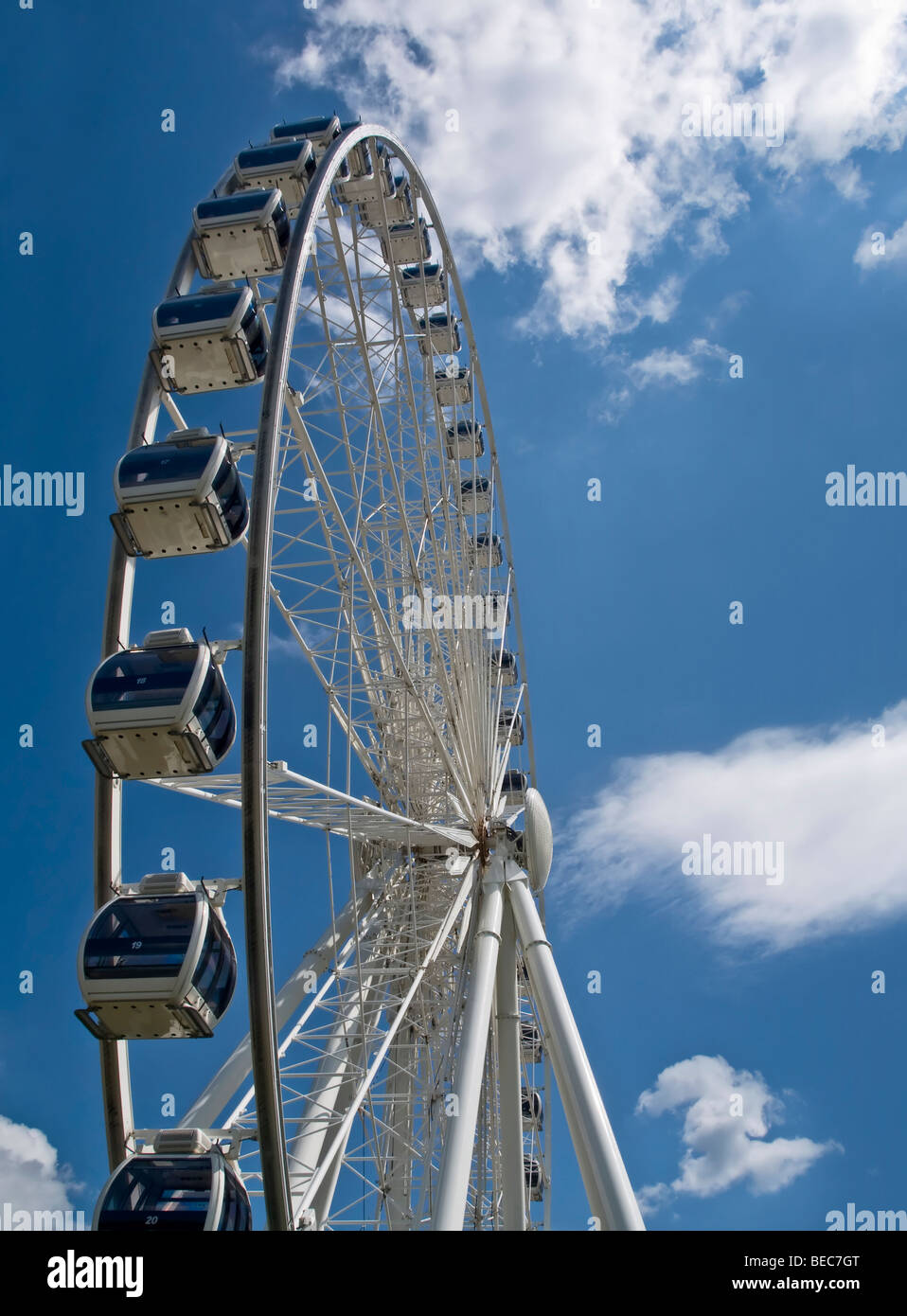 Ferris wheel located in an amusement park, seen in vertical format Stock Photo