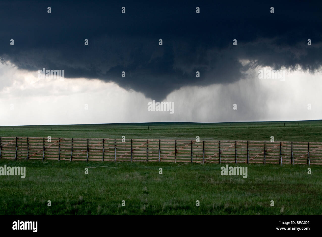 A funnel cloud lowers from the sky in Goshen County, Wyoming, USA, June