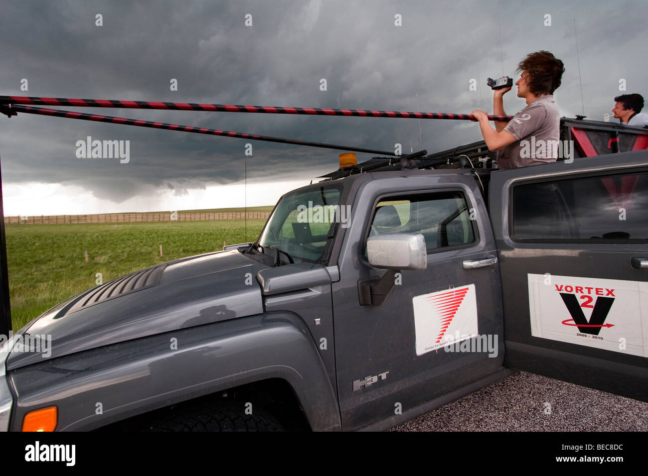 Journalist Will Grey films a developing tornado in Goshen County, Wyoming, USA, June 5, 2009, during Projetct Vortex 2. Stock Photo