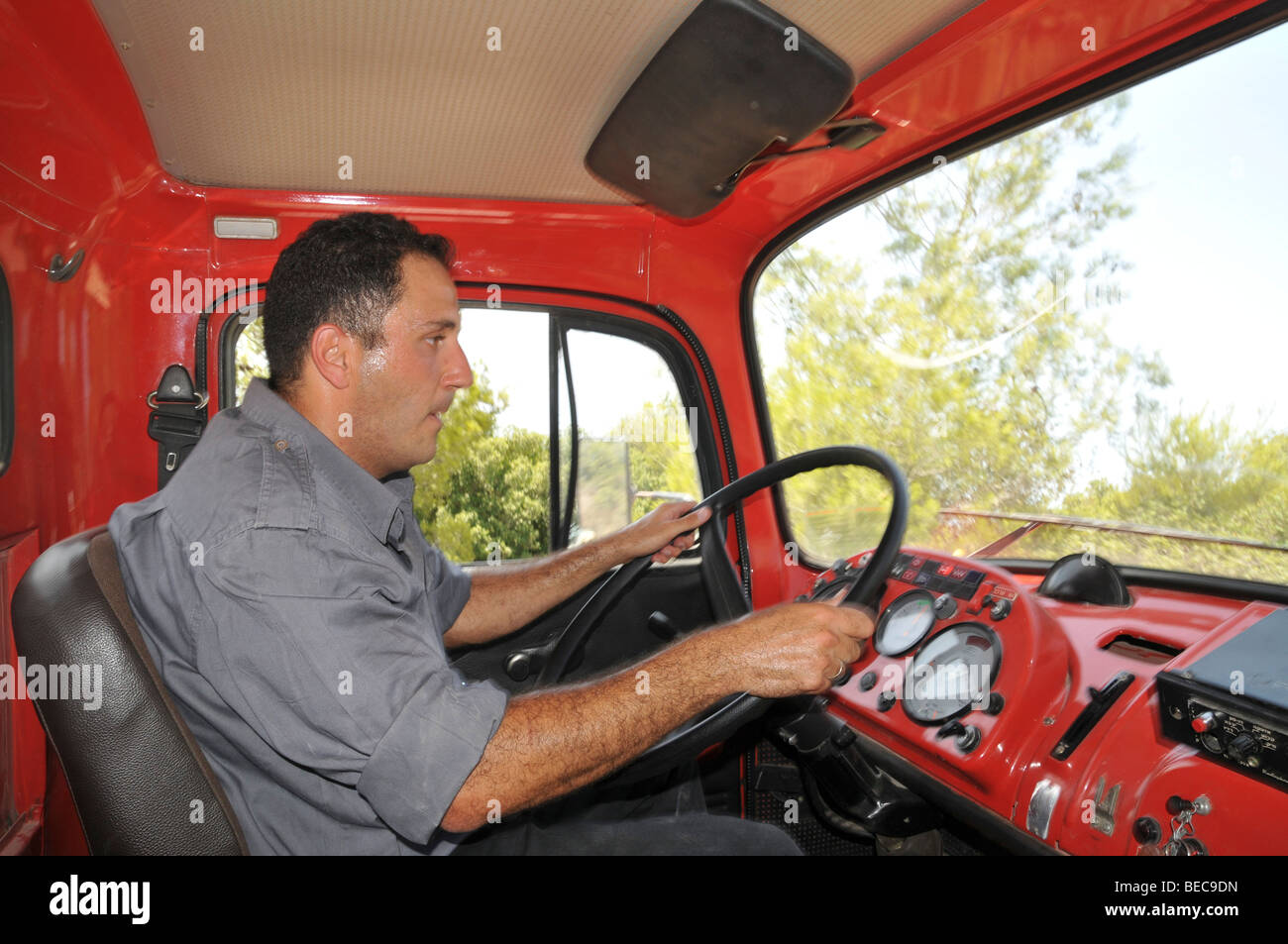 Israel, Carmel Mountain, Shekef Forest, Fire fighter driving a fire ...