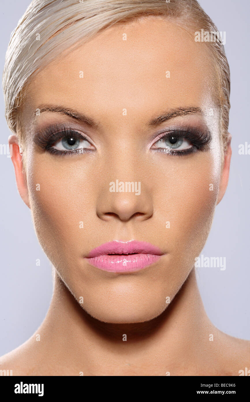 one of two images showing airbrushing and re-touching in a before and after shot Stock Photo