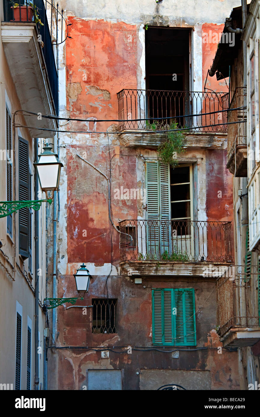 Windows and balconies in back street Palma Mallorca Spain Stock Photo