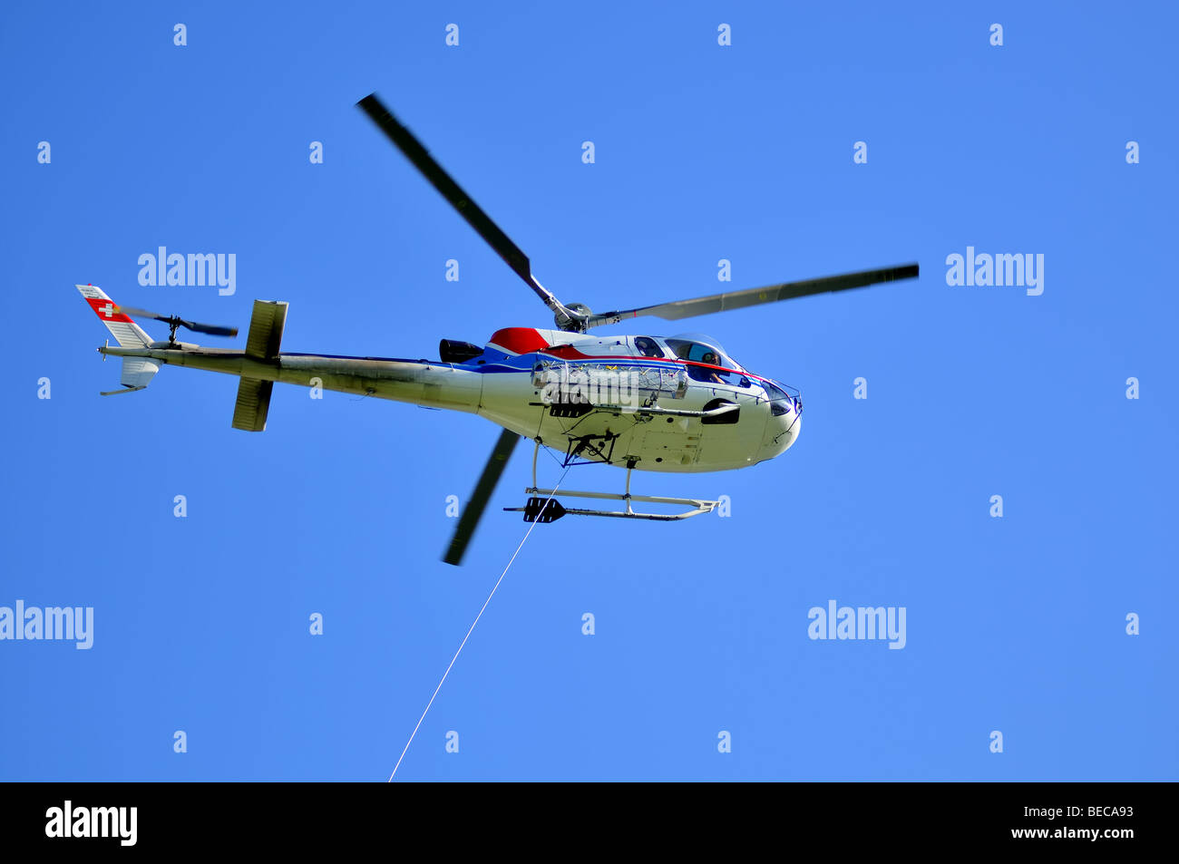 helicopter and tow cable Stock Photo