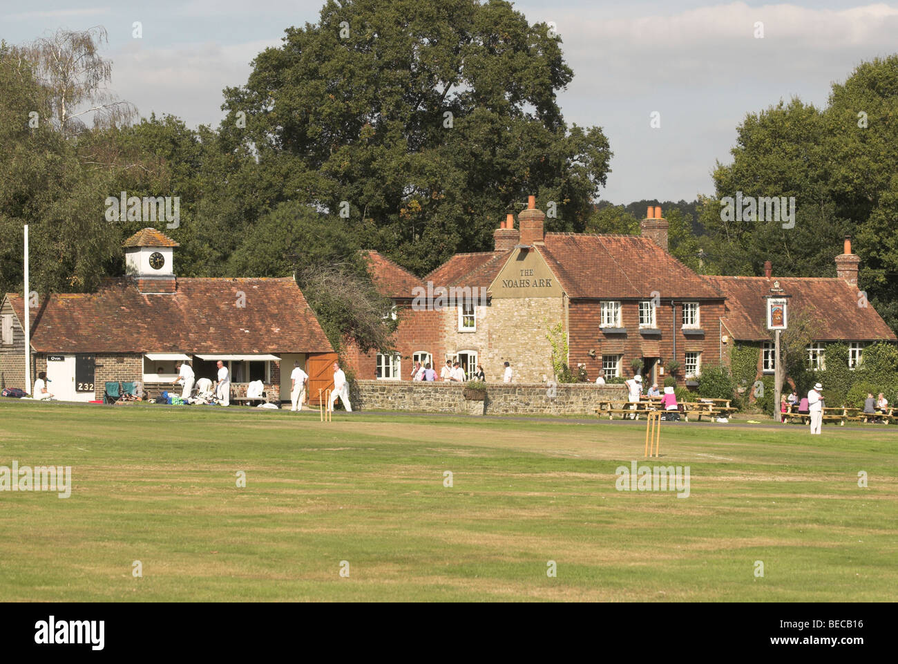 Lurgashall village green sees players readying for a game of cricket on a warm sunny autumn day. Stock Photo