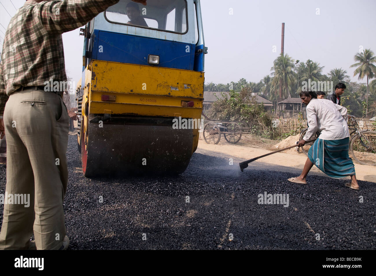 Tarring the road Bangladesh Stock Photo Alamy
