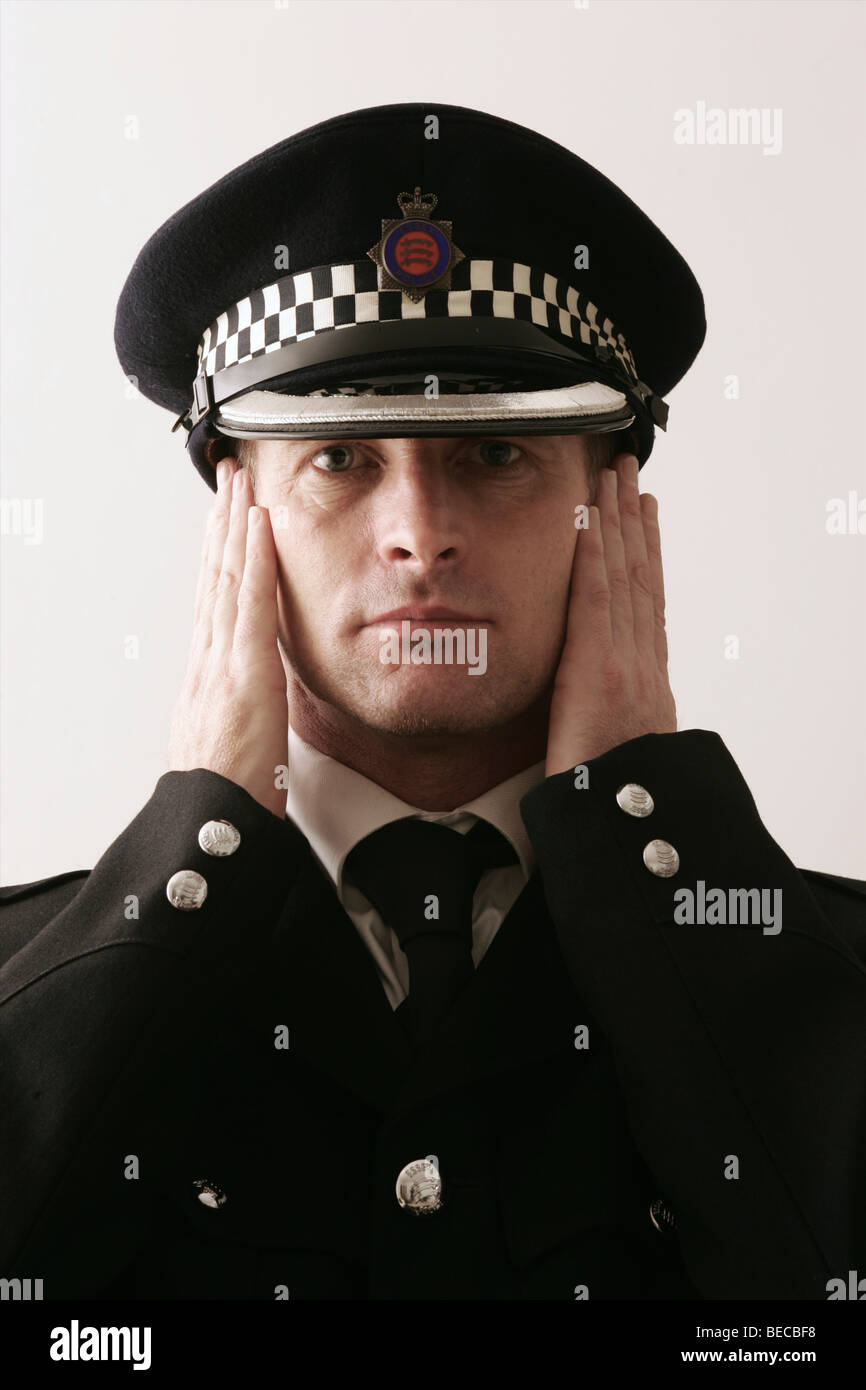 British Policeman on plain background Stock Photo