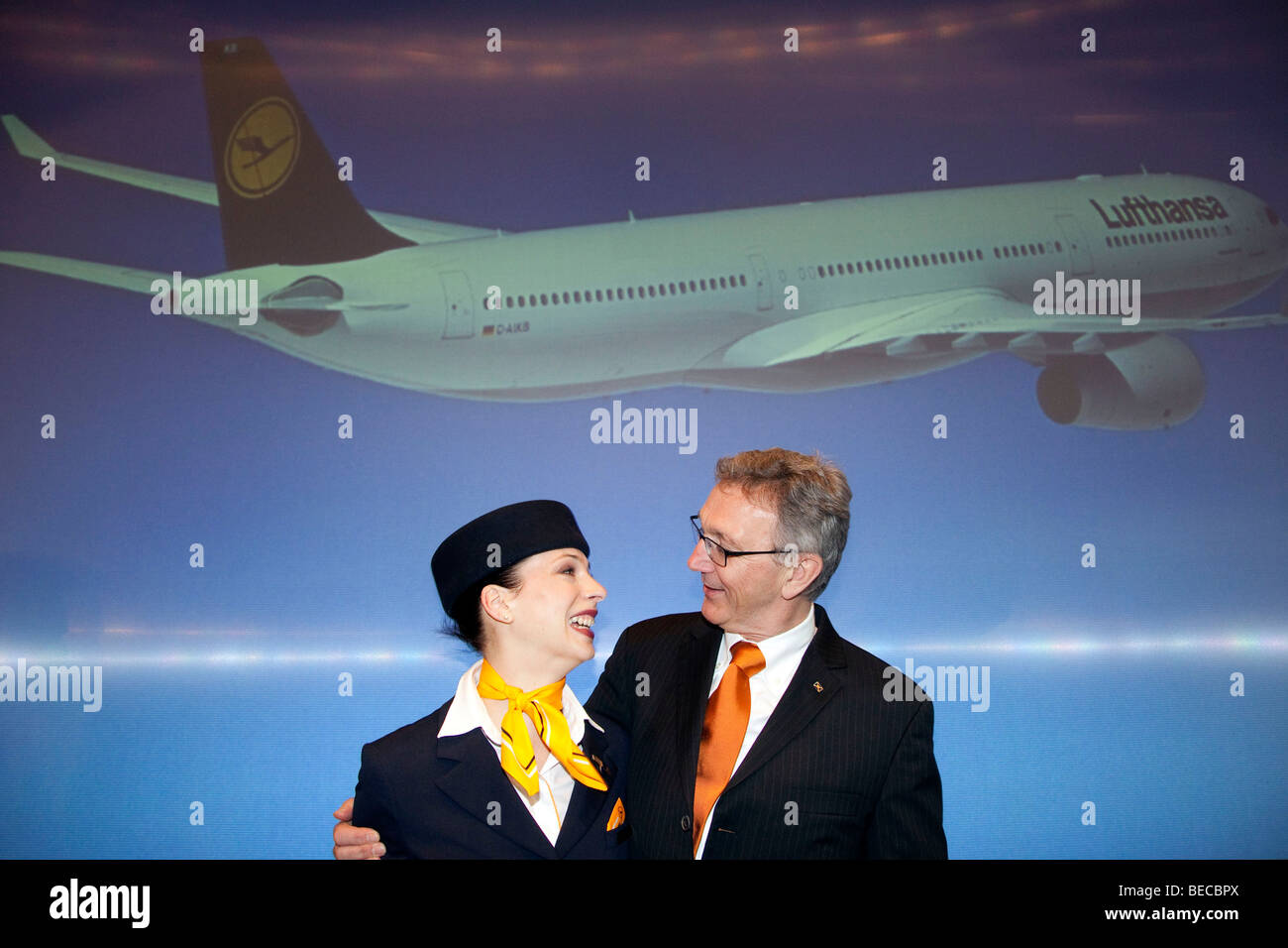 Wolfgang Mayrhuber, left, chairman and CEO of Deutsche Lufthansa AG, with flight attendant Heike Fischer, right, prior to the p Stock Photo