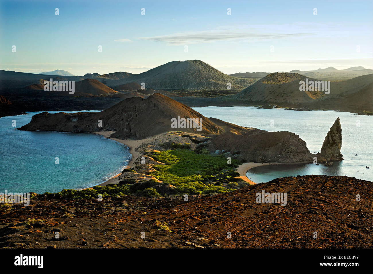 View to Sullivan Bay with beach, Pinnacle Rock and Santiago Island at horizon, Bartolomé Island, Galapagos Achipelago, UNESCO W Stock Photo