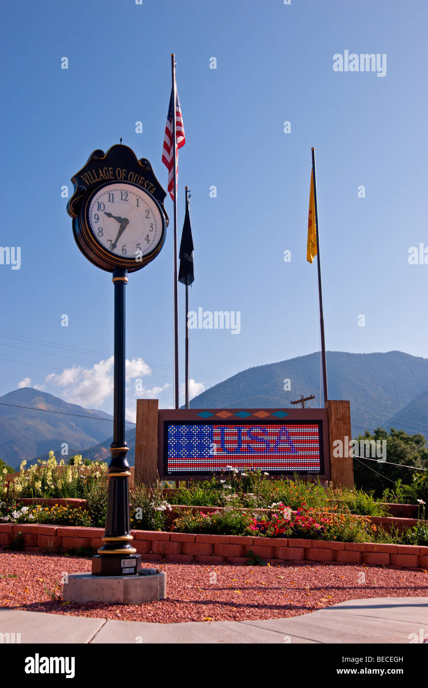 A towering timepiece stands tall in a memorial park in Questa, New Mexico. Stock Photo