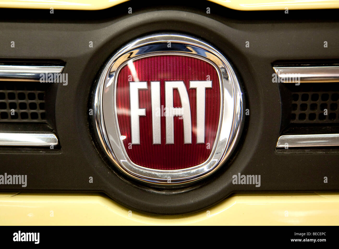 Fiat badge on red fiat 500 car with snow Stock Photo - Alamy