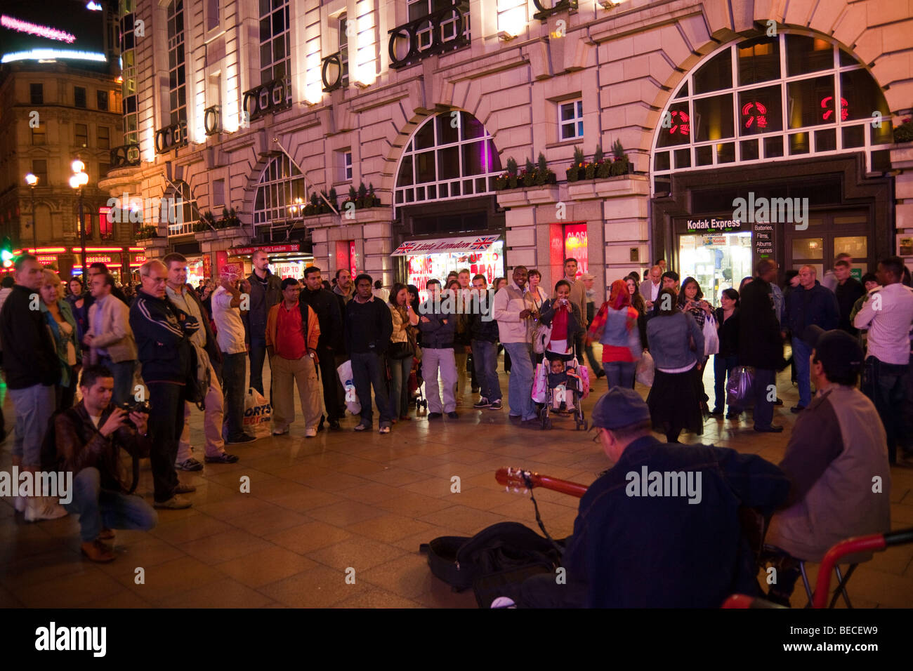 buskers performing at Piccadilly Circus, London, England, UK Stock Photo