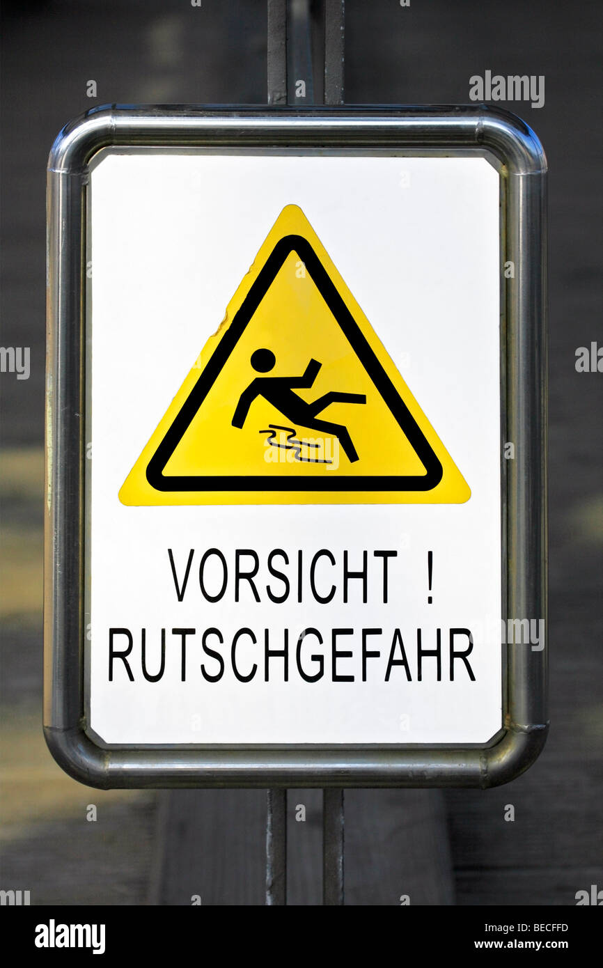 Sign, warning, Vorsicht Rutschgefahr, caution slippery Stock Photo